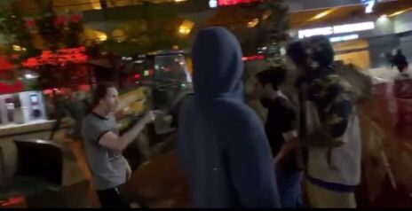 Still No. 3 from sidewalk video of confrontation (web)